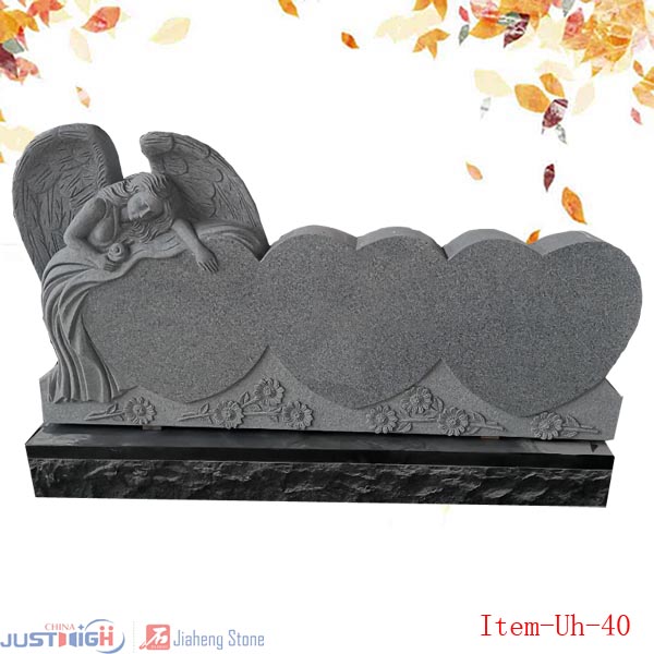 Angel carved heart shape tombstone